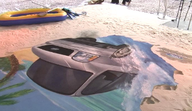Upside down perspective on 3D street painting for Ford, Mexico