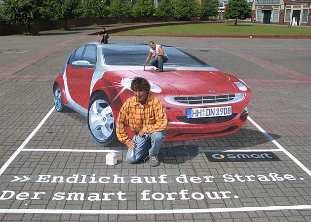 Artist with his 3D street painting - perspective playing tricks with perspective